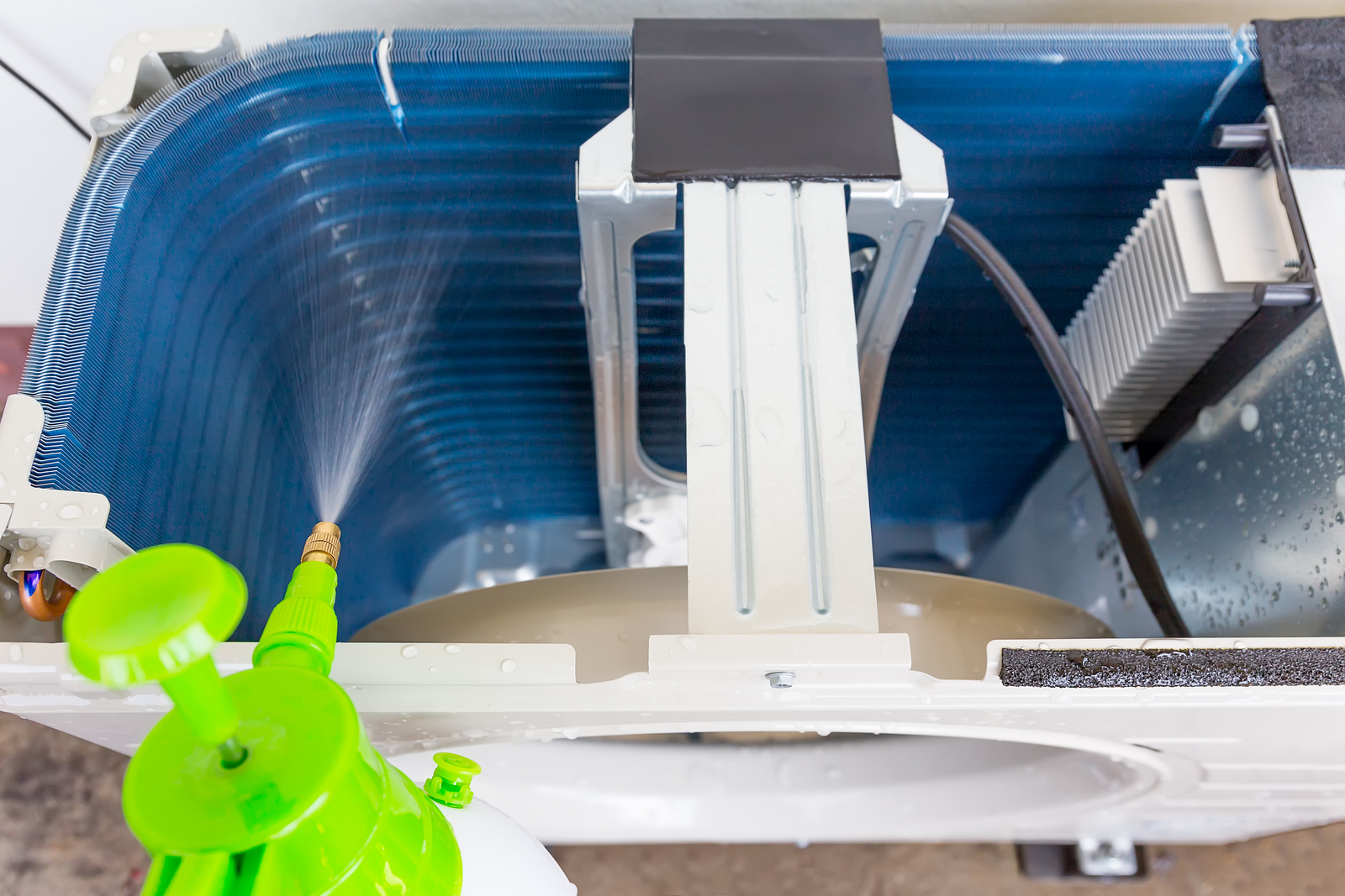 Air compressor part of air conditioner system and cleaning work.